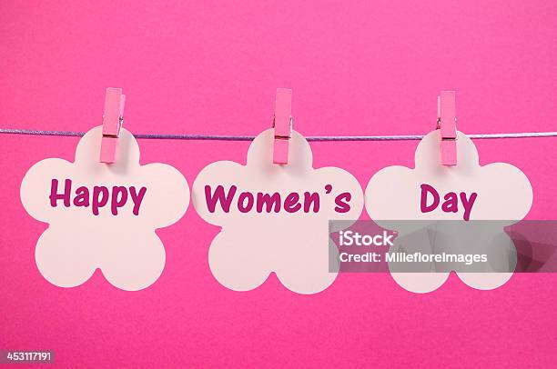 Happy Womens Day Greeting Across Pegs On A Line Stock Photo - Download Image Now - Bunting, Celebration, Clothespin