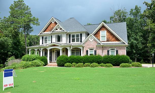 istock Large new home with a for sale sign 453121233