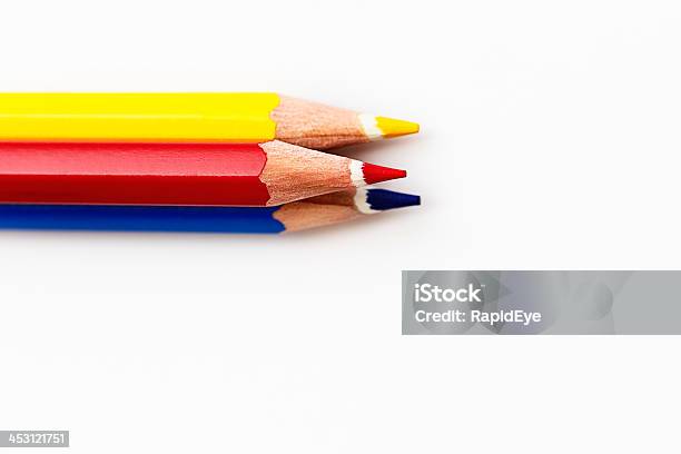 Primarycolored Trio Of Pencil Crayons On White Stock Photo - Download Image Now - Art and Craft Equipment, Blue, Color Image