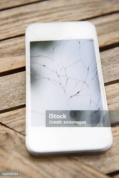 Cracked Smart Phone Stock Photo - Download Image Now - Bright, Brightly Lit, Damaged