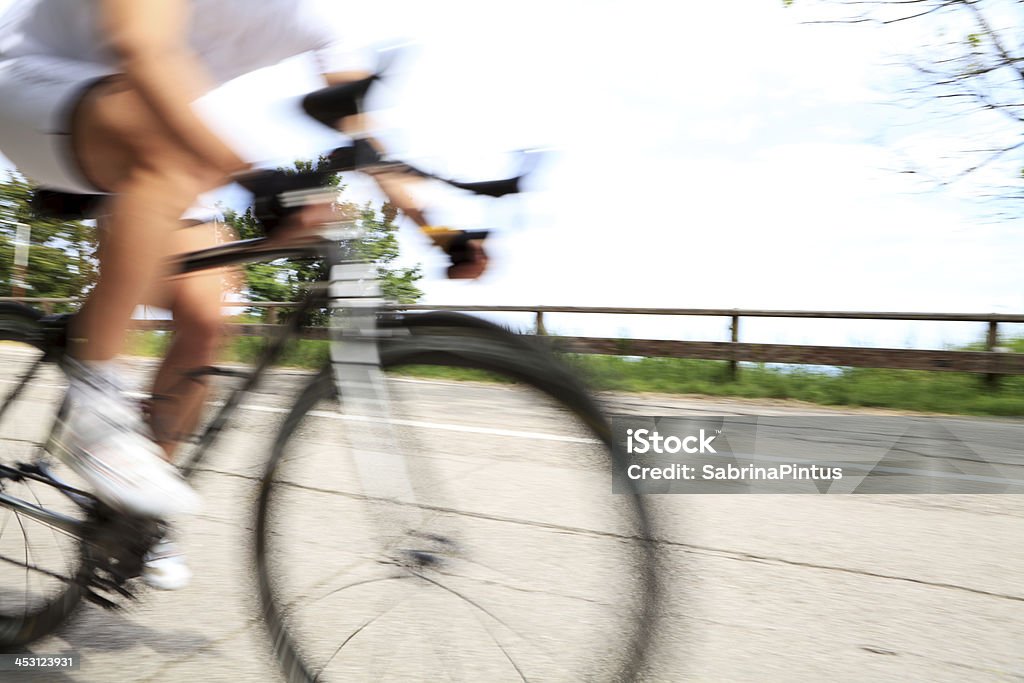 Cyclist, blurred motion. Active Lifestyle Stock Photo