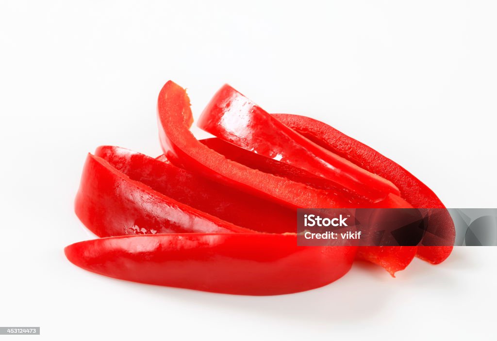 Fatias de pimentão vermelho - Foto de stock de Fatia royalty-free