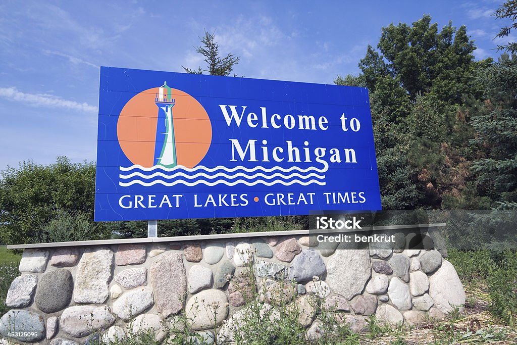 Michigan Welcome Sign Michigan Welcome Sign - summer time. Michigan Stock Photo