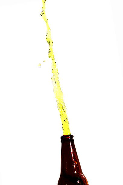 istock Green water that springs out of the bottle. 453127037
