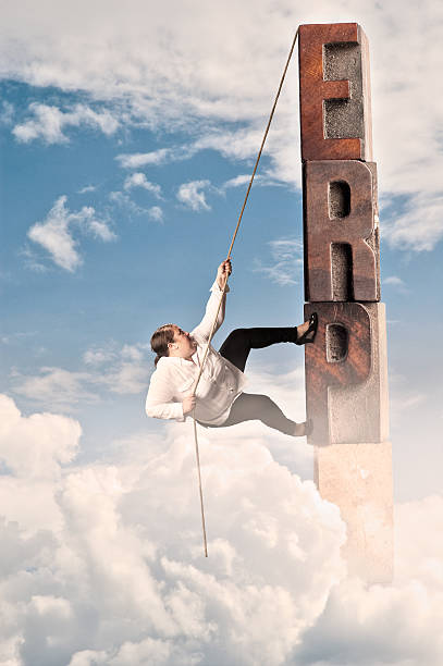 istock woman climbing on erp word 453127475