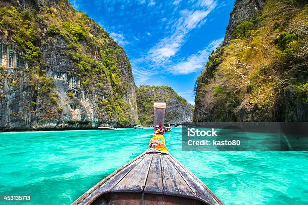 A Wooden Boat Sailing Near Phi Island In Thailand Stock Photo - Download Image Now - Ko Samui, Thailand, Koh Tao - Thailand