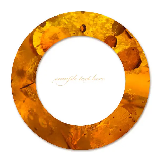 Photo of Concept of circle with amber texture and empty place