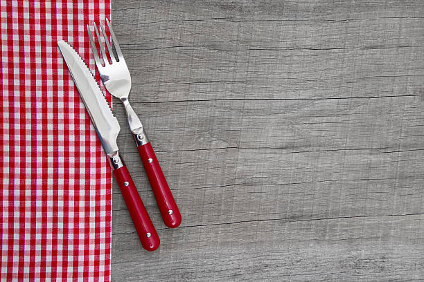 istock Knife and fork -  country style table decoration with wood. 453142389