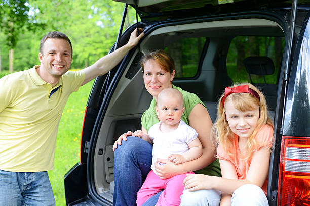 istock happy family traveling by car 453143573