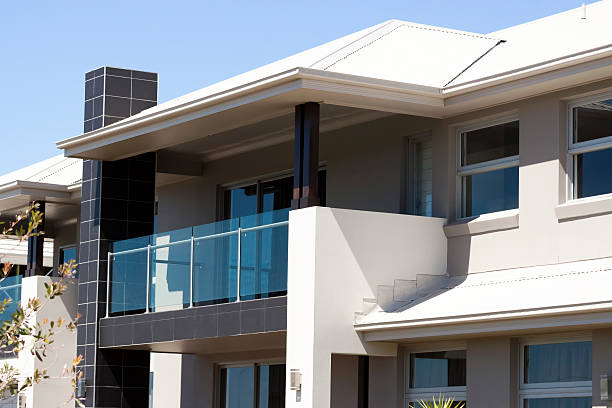 istock CLoseup brand new house against blue sky, copy space 453143997