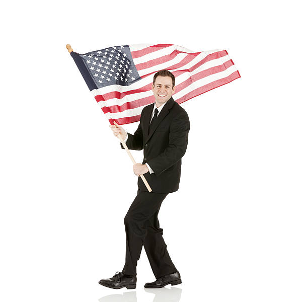 istock Businessman holding an american flag 453145629