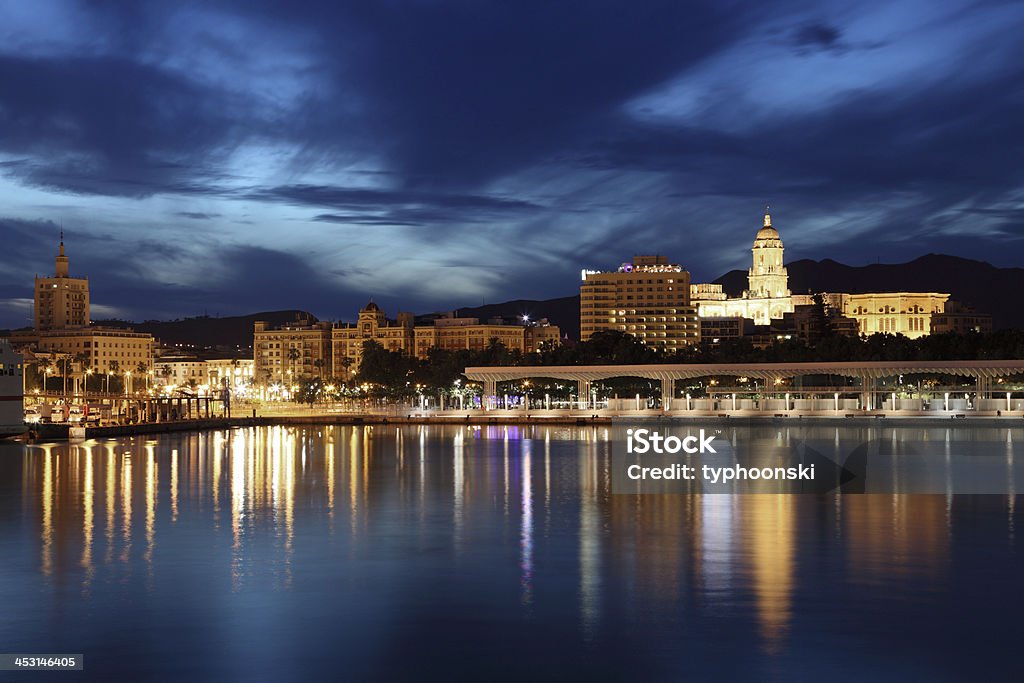 City of Malaga at dusk. Spain City of Malaga illuminated at dusk. Andalusia, Spain Málaga Province Stock Photo