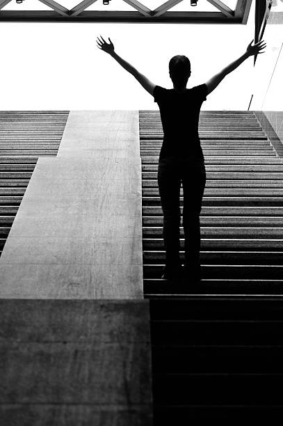 istock woman stand underground stairs 453148083