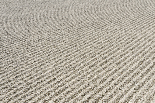 Gravel texture from a meditation garden inside temple in Kyoto, Japan.