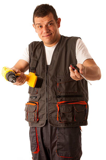 istock Young mechanic isolated over white background 453154775
