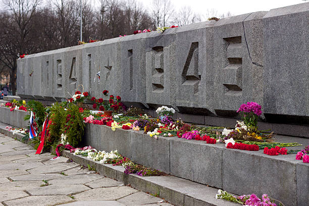 istock Flowers dropped at Victory Monument in Riga 453155205