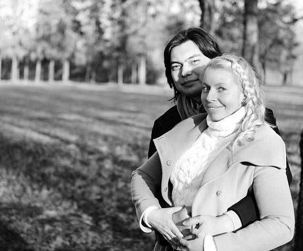 istock couple walking in the park 453156733