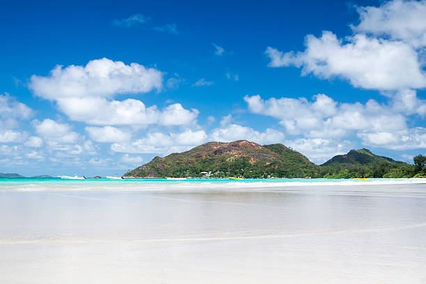 istock La Digue island, Seyshelles, Anse Source d'Argent. Sailing yacht 453158579