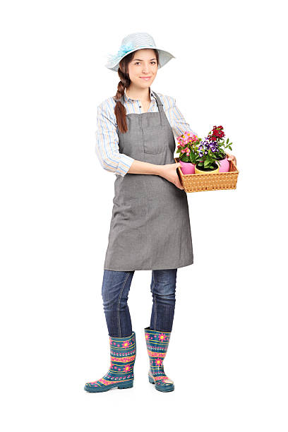 female gardener holding flower plants - gardening women florist flower стоковые фото и изображения