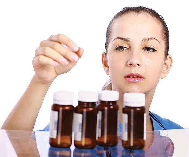 istock female doctor holding a bottle pills 453161195