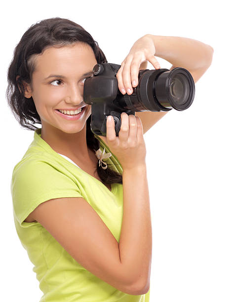 istock Beautiful young woman with camera 453162143
