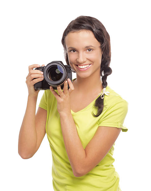istock Beautiful young woman with camera 453162147