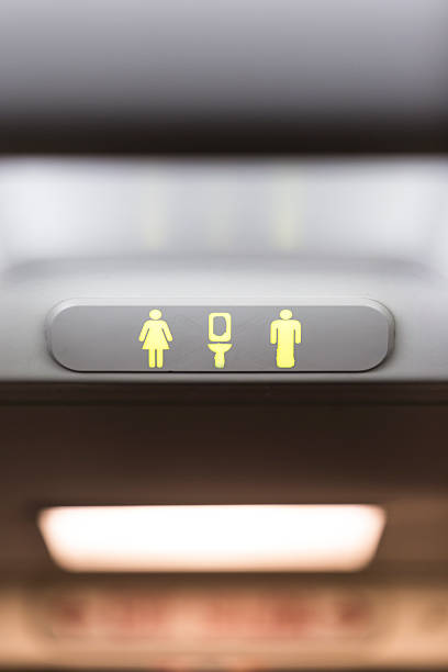 Unoccupied aircraft lavatory sign stock photo