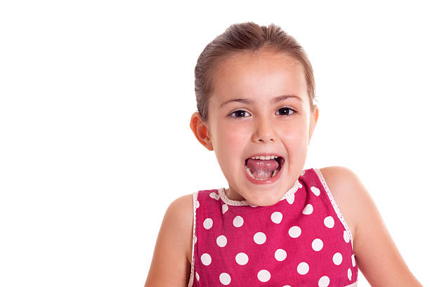 istock cute little girl making a funny faces 453163051