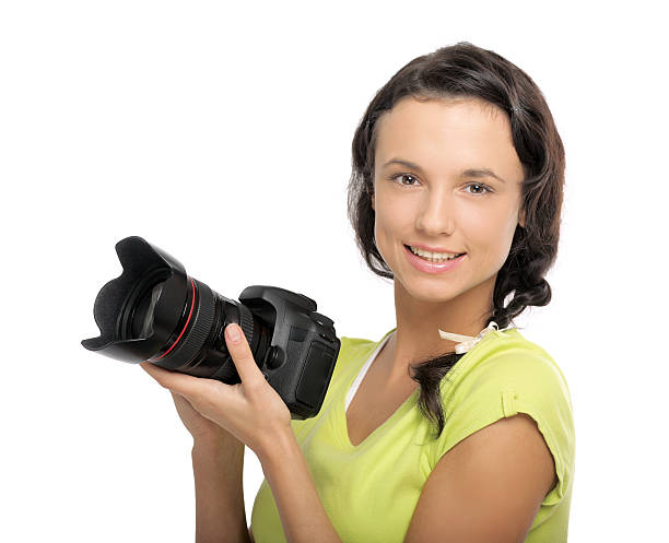 istock Beautiful young woman with camera 453165839