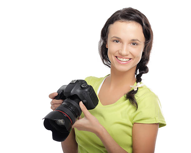 istock Beautiful young woman with camera 453165889