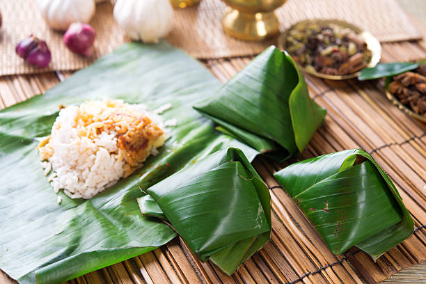 istock Nasi lemak wrapped with banana leaf. 453166091