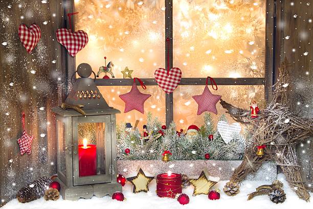istock Red Christmas decoration with lantern on window sill 453170833