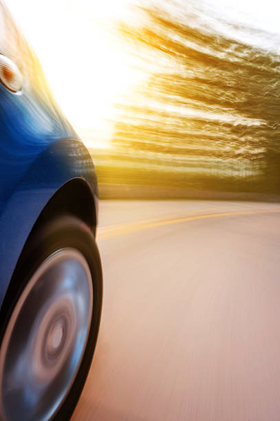 istock car on road with motion blur background 453171051