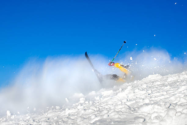 istock Skier man falling down to the snow -Blur motion 453173695