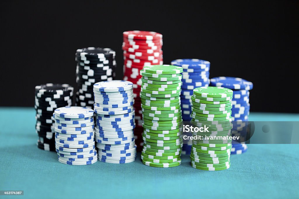 Gambling chips Gambling chips on black background Black Background Stock Photo