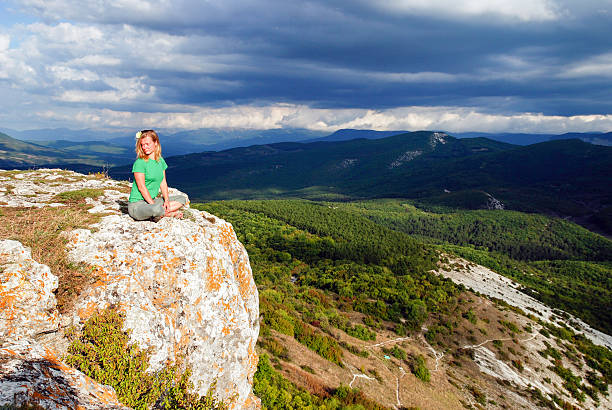 istock Girl meditation at the mountains 453175919