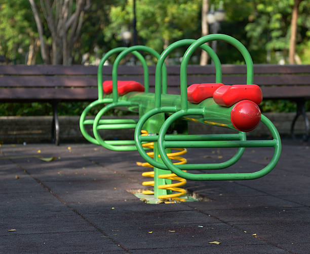 istock swing carousel in the park for children 453175993