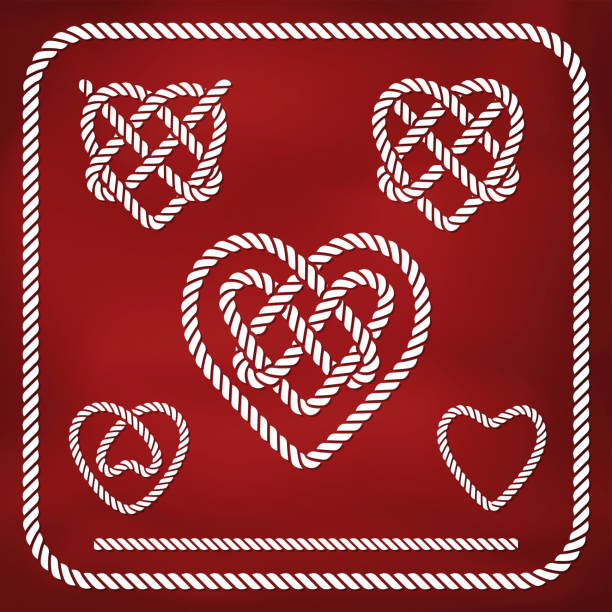 Heart shape rope knots Heart shape rope knots set. Gradient mesh ropes tied together stock illustrations
