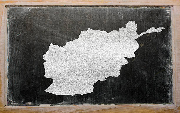 istock outline map of afghanistan on blackboard 453186821