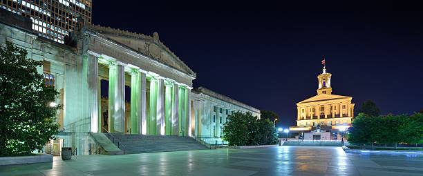 Nashville War Memorial Auditorium and Tennessee State Capitol in Nashville, Tennessee, USA.