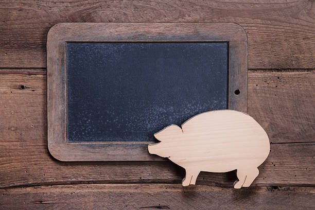 istock Menu board with pig on wooden background for New Year's 453192443