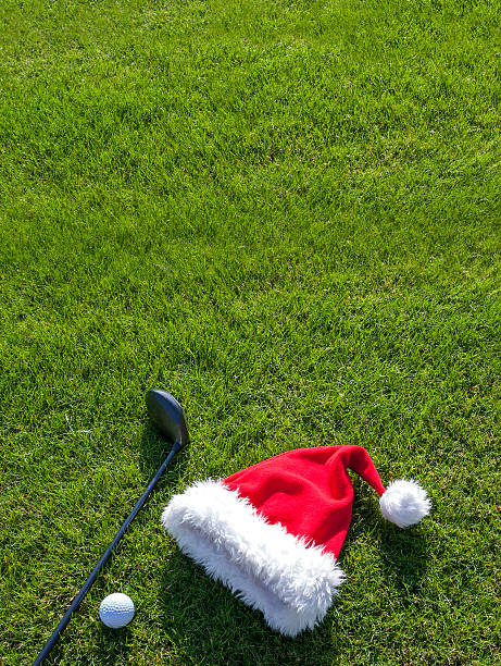istock Christmas hat and golf equipment 453194027