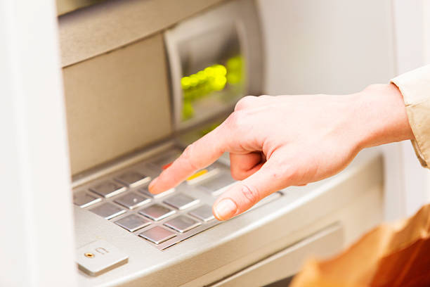 istock Cash Withdrawal Hand 453194125