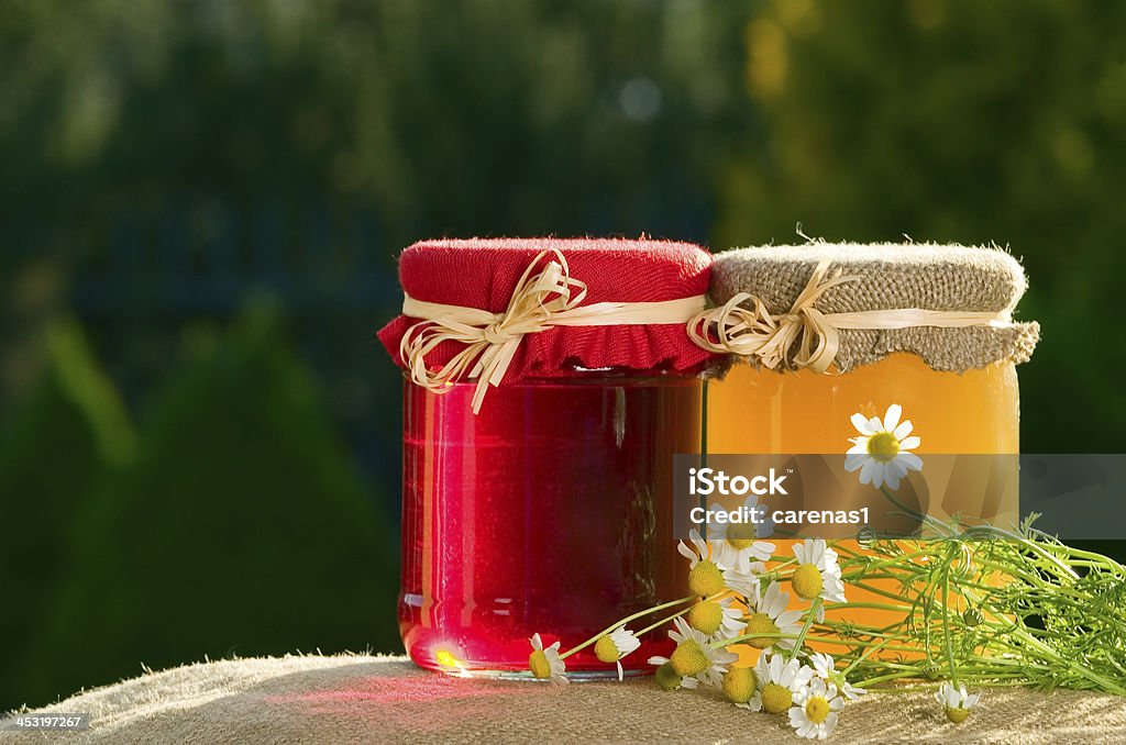 Dżem i miód na zielonym tle - Zbiór zdjęć royalty-free (Aromaterapia)