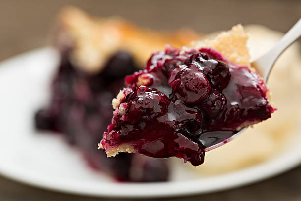 Bite Of Blueberry Pie stock photo