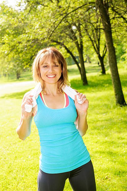 istock Woman exercising in park 453202615