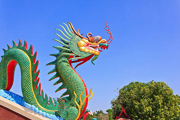 istock Green Chinese Dragon and blue sky 453204303