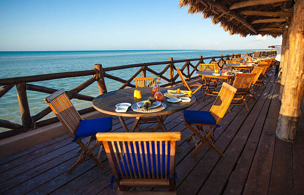 istock Summer empty open air restaraunt near sea at sunset 453205433