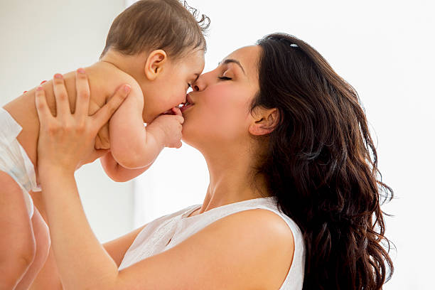 istock Mother and Baby Kissing 453206277