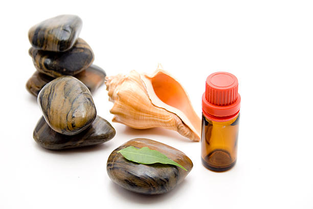 istock Smell oil with stones and mussel 453208645